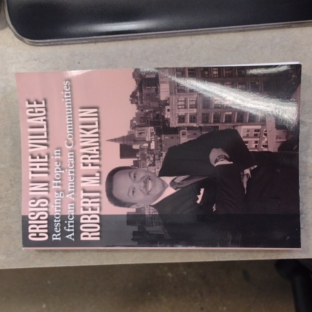 Signed copy crisis in the village by Robert Franklin